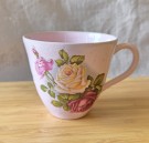 Rosa kopp med roser thumbnail